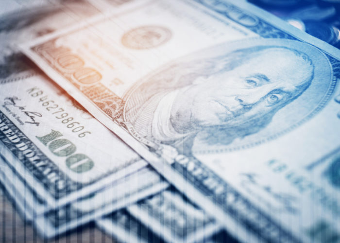 Dollar bills and finance and banking on digital stock market financial exchange Dollar bills and finance and banking on digital stock market financial exchange